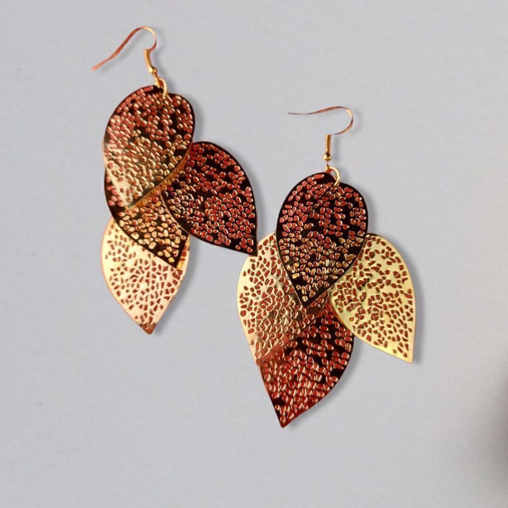 Cascading gold tone fashion earrings fillagree